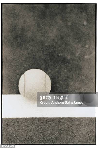 close-up of tennis ball on tennis court - tennis court stock pictures, royalty-free photos & images