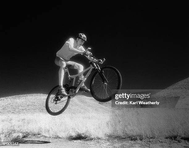 man riding mountain bike - karl stock pictures, royalty-free photos & images