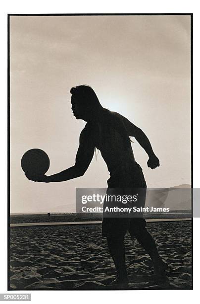 silhouette of volleyball serve - saint anthony stock pictures, royalty-free photos & images