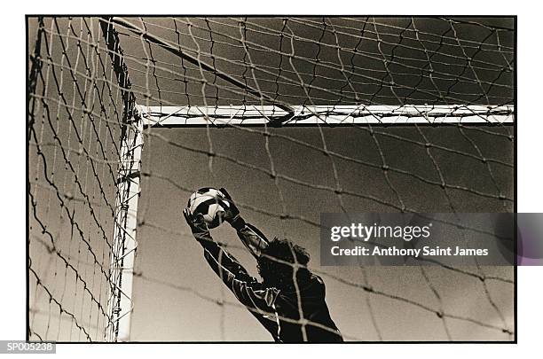 goalie catching ball - saint anthony stock pictures, royalty-free photos & images