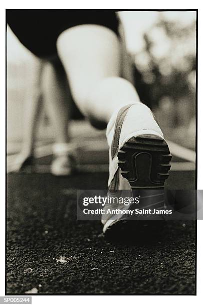 close-up of athlete's foot on running track - saint anthony stock pictures, royalty-free photos & images