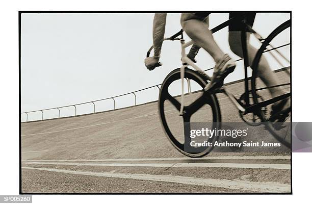 detail of man on bicycle - saint anthony stock pictures, royalty-free photos & images
