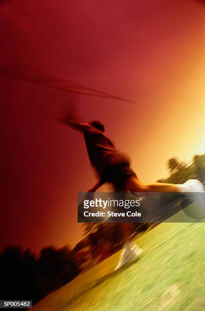 man throwing a javelin - mens field event stockfoto's en -beelden