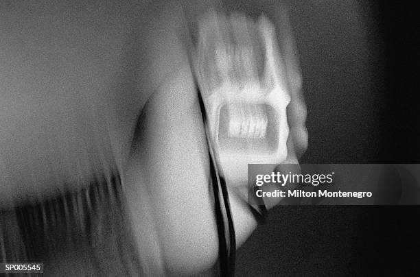 person holding a stopwatch - ancine stockfoto's en -beelden