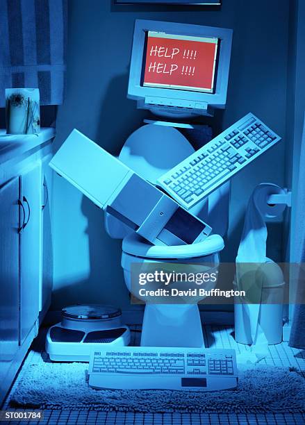 computer in toilet - computer rage stock pictures, royalty-free photos & images