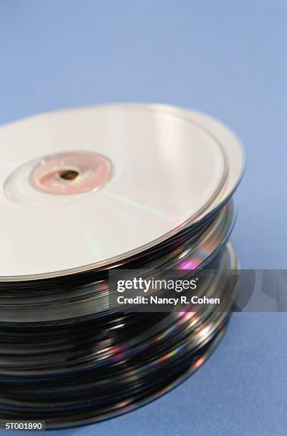 stack of compact discs - cd stack stock pictures, royalty-free photos & images