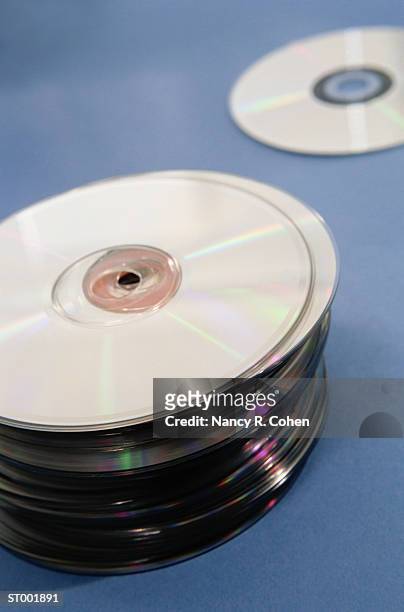 stack of compact discs - pharrell williams of n e r d sighting in new york ctiy stockfoto's en -beelden