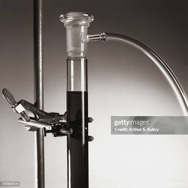 laboratory glassware on clamp stand - science clamp stock pictures, royalty-free photos & images