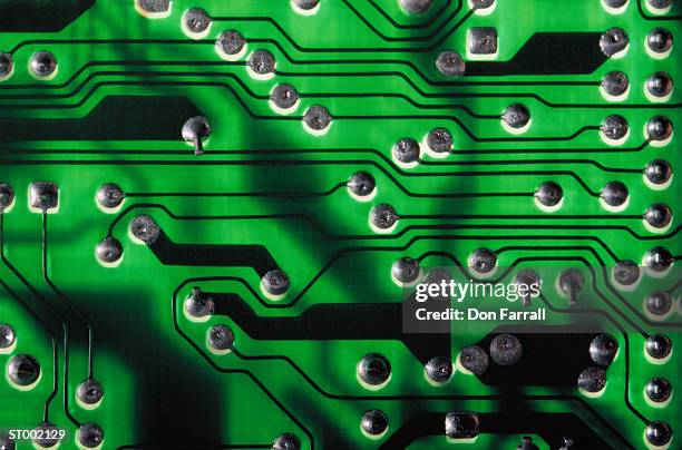 circuit board close-up - don farrall stock pictures, royalty-free photos & images