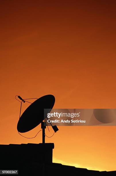 silhouette of satellite antenna - andy stock pictures, royalty-free photos & images