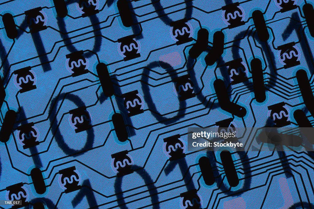Binary code superimposed on circuit board