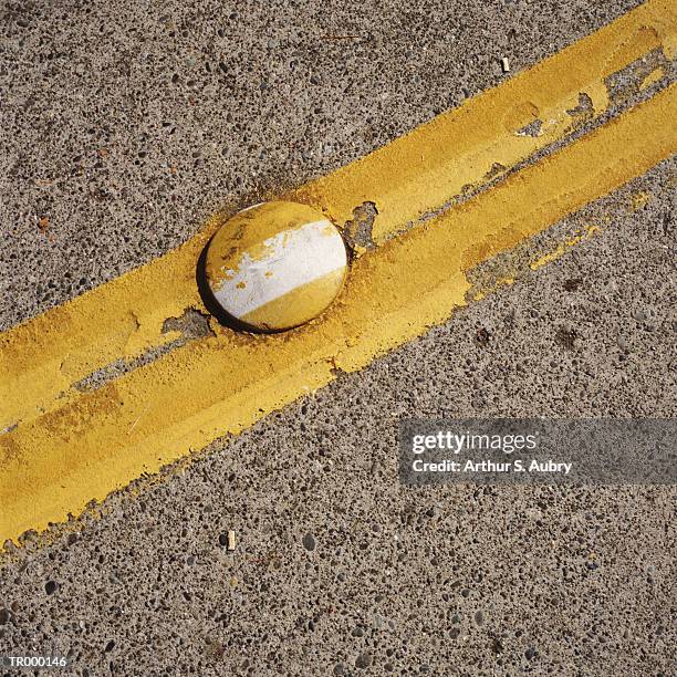 close-up above of median strip - road reflector stock pictures, royalty-free photos & images