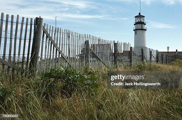 lighthouse and fence - jack and jack stock pictures, royalty-free photos & images