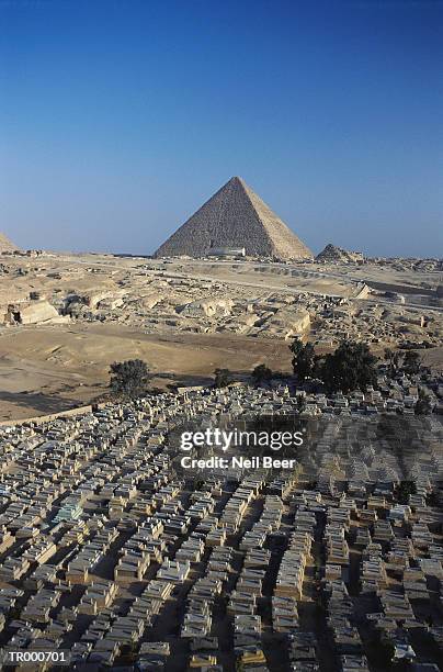 pyramids at giza with graveyards - giza pyramids aerial stock pictures, royalty-free photos & images