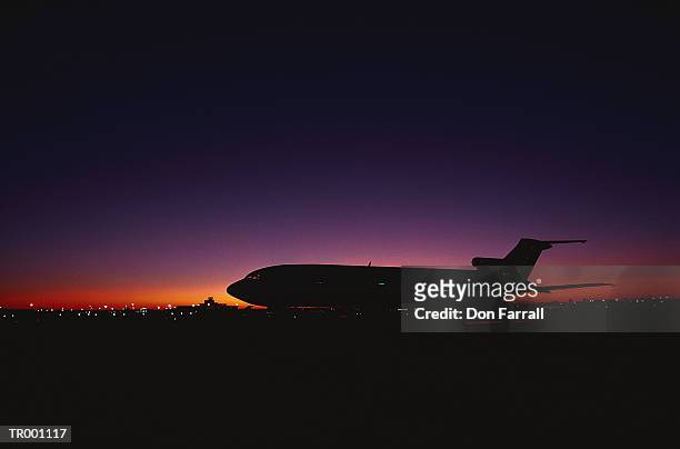 airplane silhouette - don farrall stock pictures, royalty-free photos & images