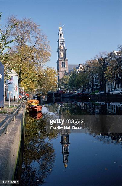 tower and reflection in canal - reflection foto e immagini stock