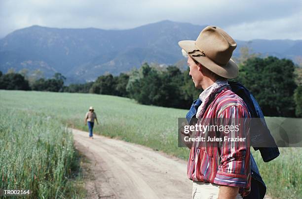 walking on road - only mature men fotografías e imágenes de stock