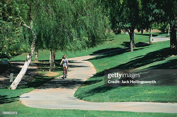 teen girl on bicycle - los angeles missions end of summer block party time to enjoy being a kid stockfoto's en -beelden