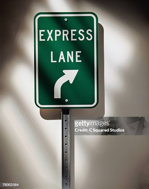 express lane road sign - express stock-fotos und bilder