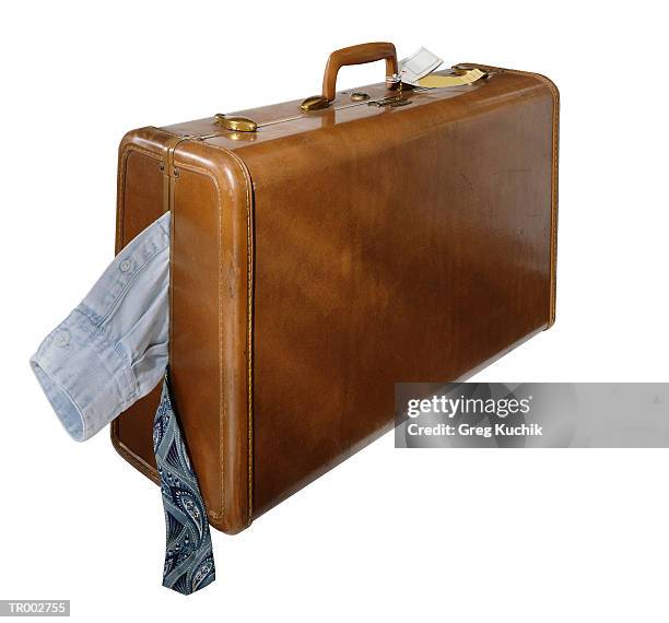 luggage with clothes hanging out - went out stock pictures, royalty-free photos & images