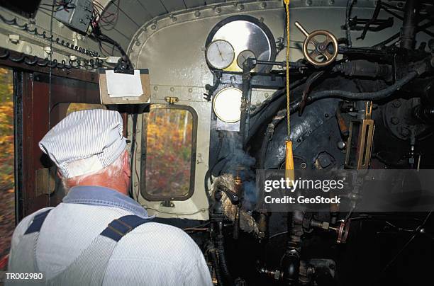 inside locomotive - só homens idosos imagens e fotografias de stock