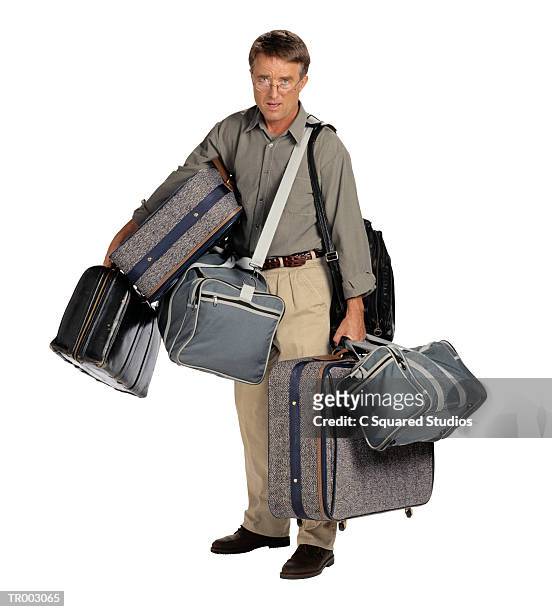 traveler burdened with luggage - only mature men imagens e fotografias de stock
