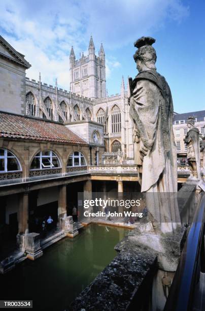 statue overlooking bath - roman bath england stock pictures, royalty-free photos & images