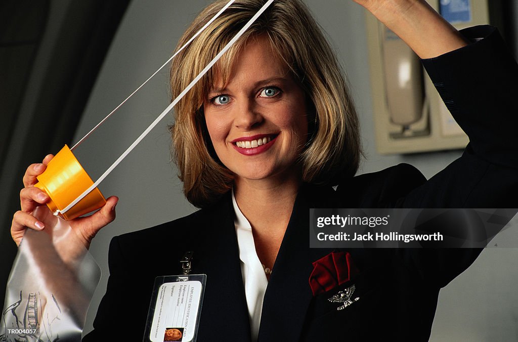 Flight Attendant Giving Mask Demonstration