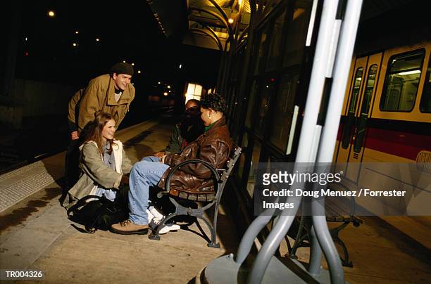 teens waiting for the subway - doug stock pictures, royalty-free photos & images