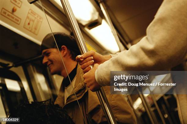 passengers on the subway - cruzeiro v cerro porteno copa bridgestone libertadores 2014 round of 16 stockfoto's en -beelden