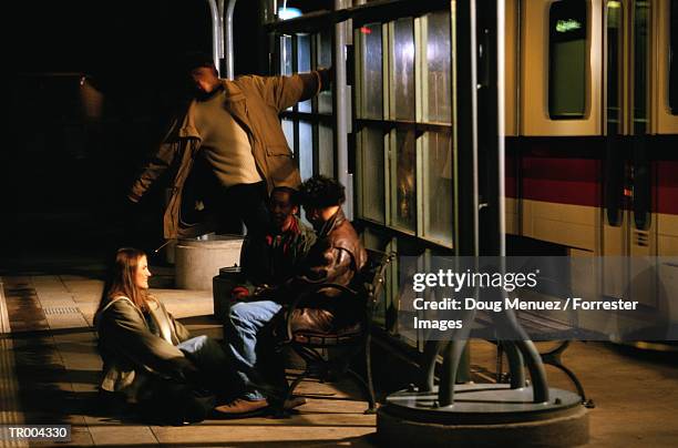 playing at the subway station - doug stock pictures, royalty-free photos & images