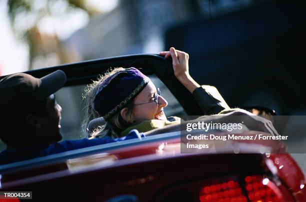 teens in car - cruzeiro v cerro porteno copa bridgestone libertadores 2014 round of 16 stockfoto's en -beelden