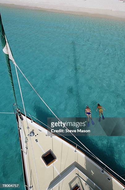 sailboat and snorkeling - nautical vessel part stock pictures, royalty-free photos & images