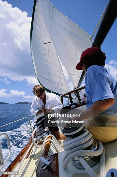 couple sailing boat - nautical vessel part stock pictures, royalty-free photos & images