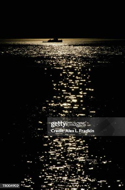 usa, washington state, puget sound, tugboat, silhouette, night - north pacific ocean stock pictures, royalty-free photos & images