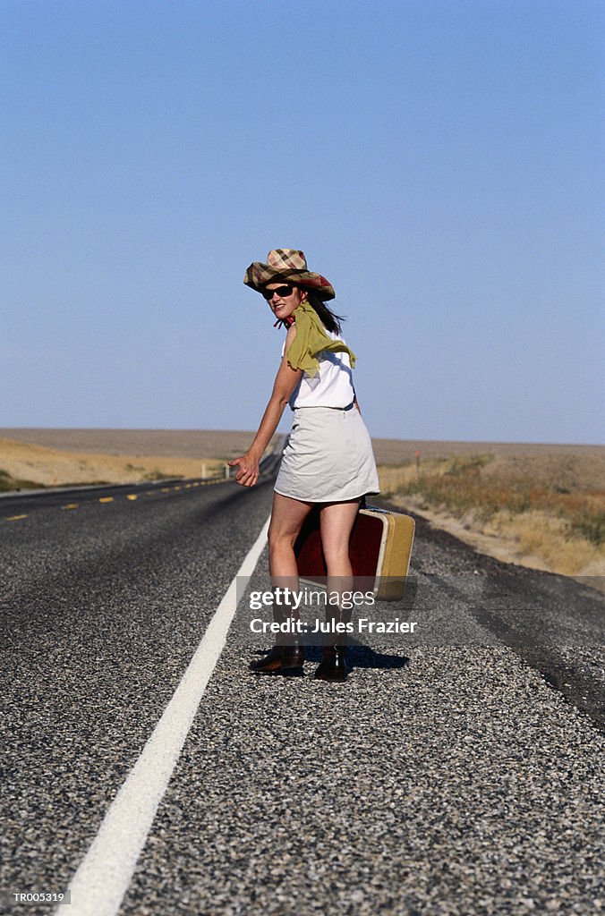 Hitchhiker with Suitcase