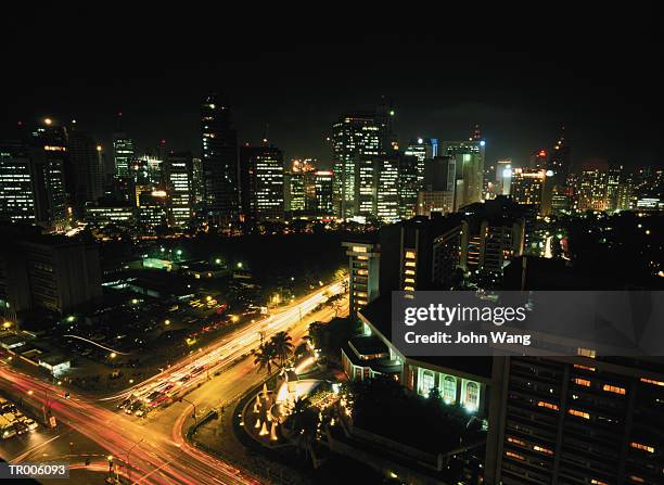 manila skyline at night - general images as xi jinping assumes chinas presidency to cement transition of power stockfoto's en -beelden