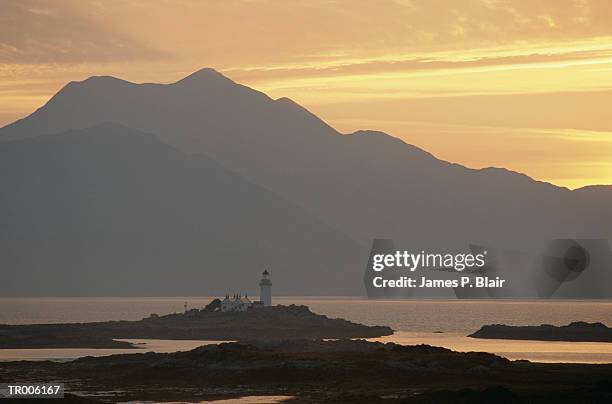 sunset over lighthouse - highland islands stock pictures, royalty-free photos & images