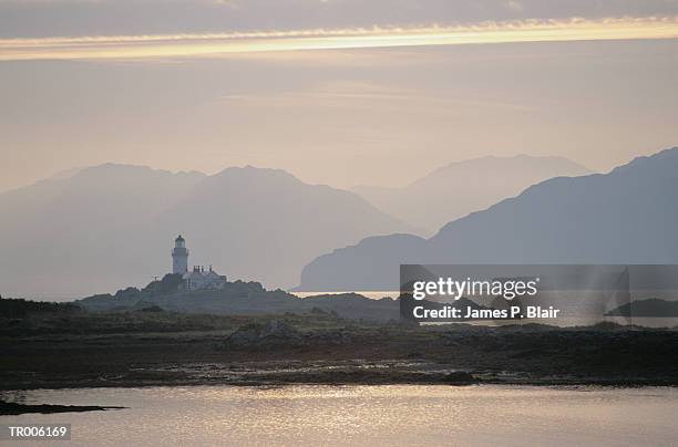 lighthouse at sunset - ハイランド諸島 ストックフォトと画像