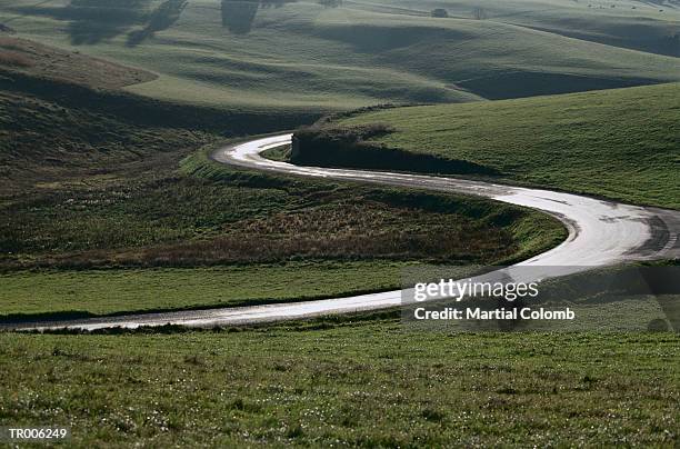road through countryside - martial ストックフォトと画像