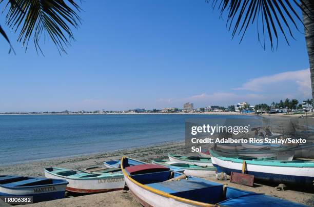 rowboats on beach in mazatlan - northern mexico stock pictures, royalty-free photos & images