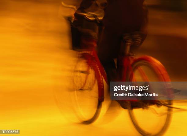 bicycle blur - unknown gender stock pictures, royalty-free photos & images