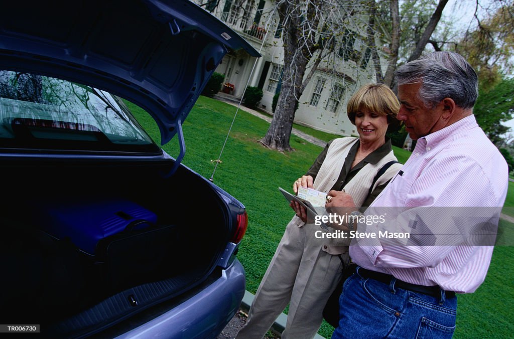 Couple with Airplane Tickets