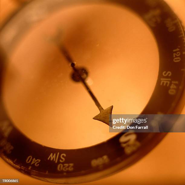 compass close-up - don farrall stock pictures, royalty-free photos & images