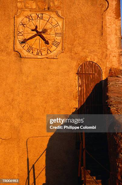 clock in roussillon, france - france foto e immagini stock