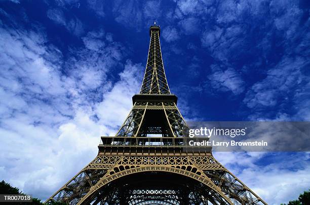 france, paris, eiffel tower, low angle view - france stock-fotos und bilder