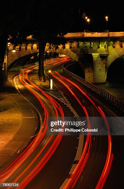 night traffic in paris, france - france foto e immagini stock