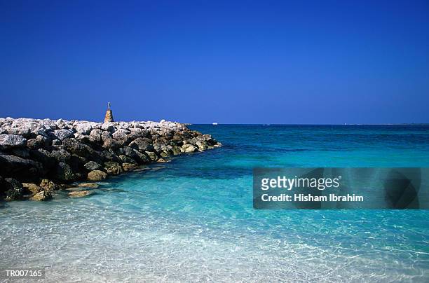 nassau jetty with beacon - cable beach bahamas stock pictures, royalty-free photos & images