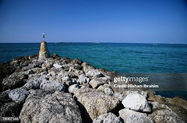 nassau jetty with beacon - cable beach bahamas stock pictures, royalty-free photos & images