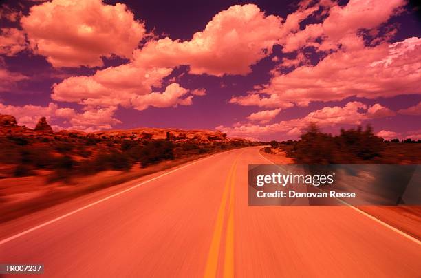 speeding along a highway - reese stockfoto's en -beelden